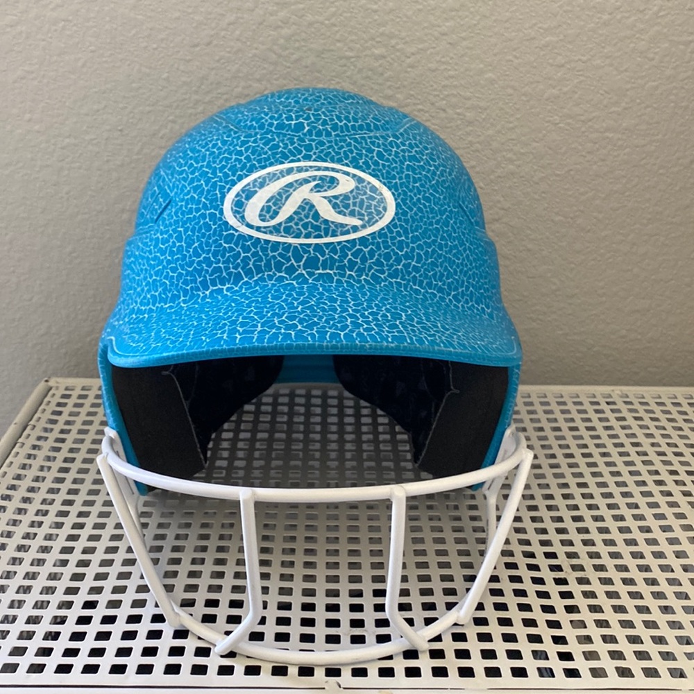 Girls softball helmet. Color blue.